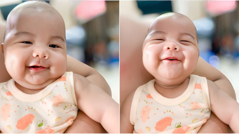 “toothless” is the word for babies who smile to show their cuteness